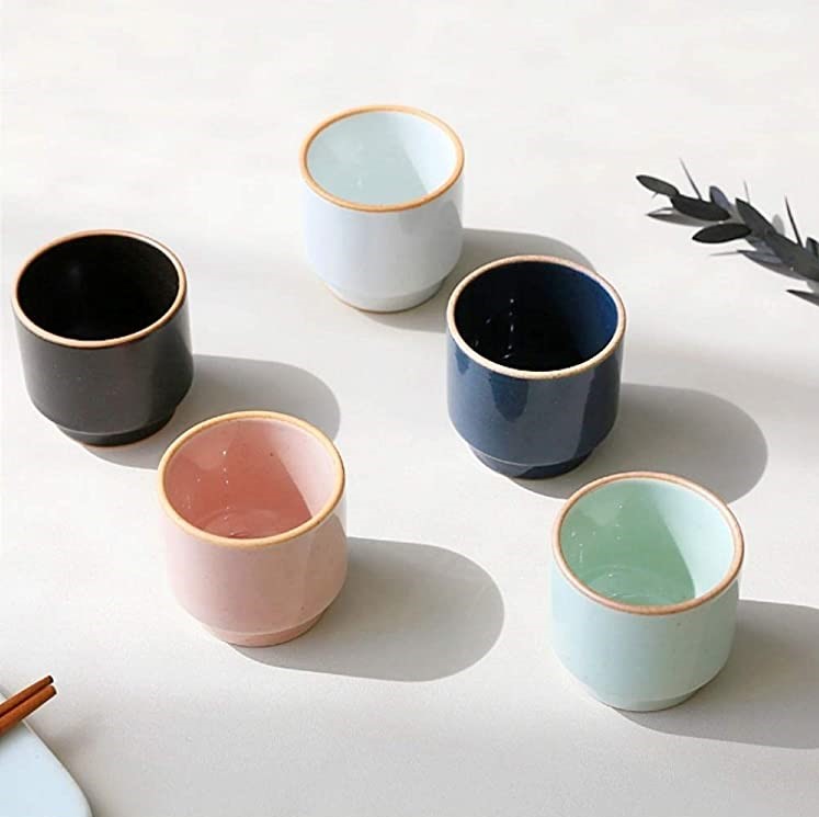 five colorful ceramic shot glasses